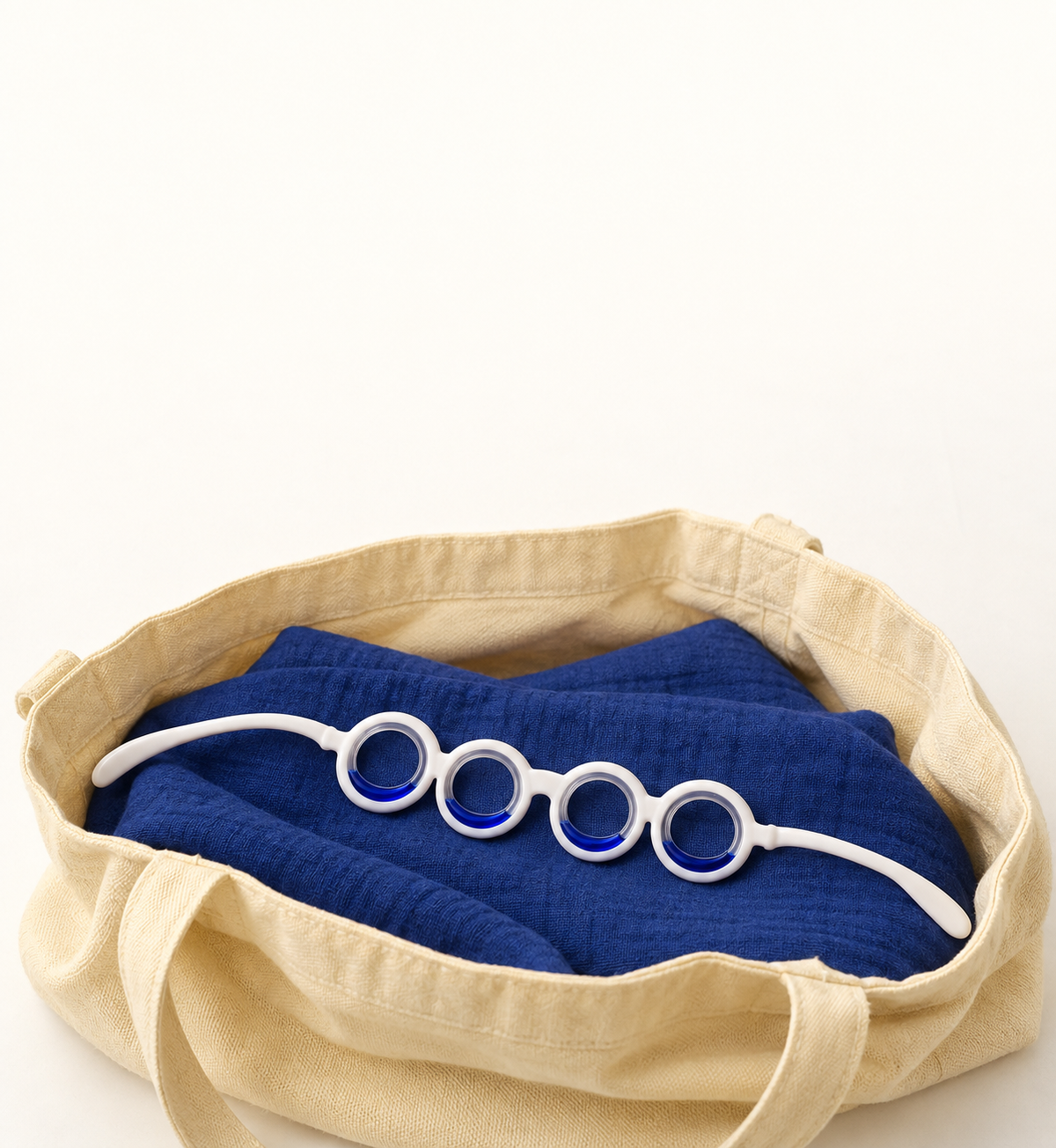 Ollaway being dropped into a travel bag